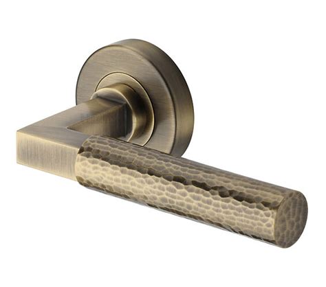 Heritage Brass Hammered Bauhaus Door Handles On Round Rose Antique Brass Ham2259 At Sold In