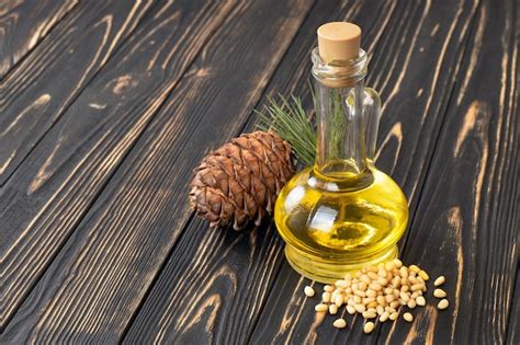 Premium Photo Cedar Oil In Glass Bottle