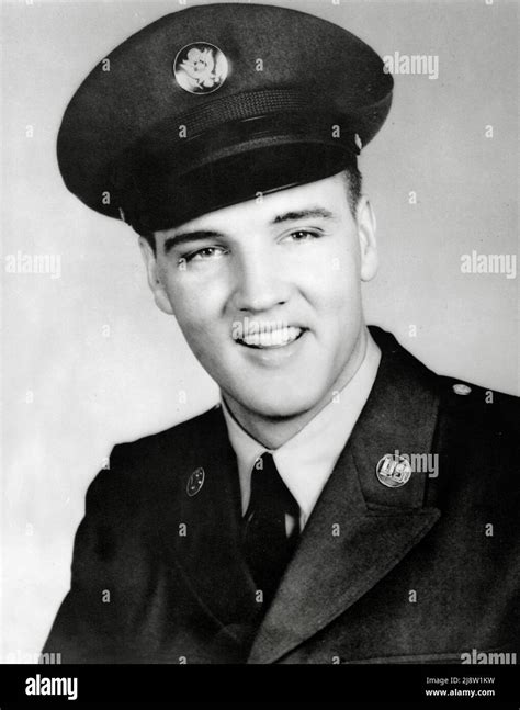 Elvis Presley, in his army uniform, circa 1958. File Reference # 34145 ...