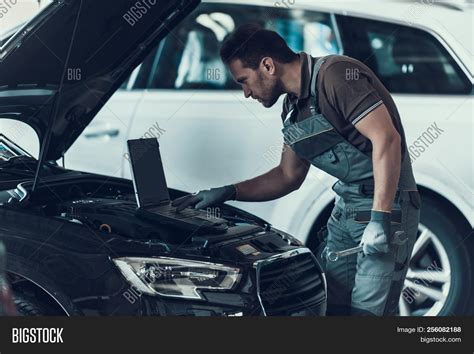 Car Mechanic Working Image & Photo (Free Trial) | Bigstock 