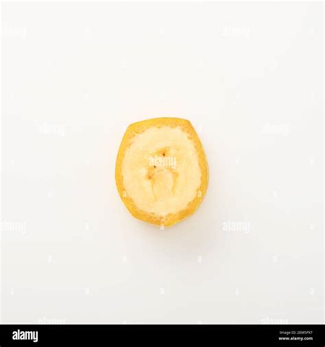 One Banana Slice Unpeeled Isolated On White Background With Clipping