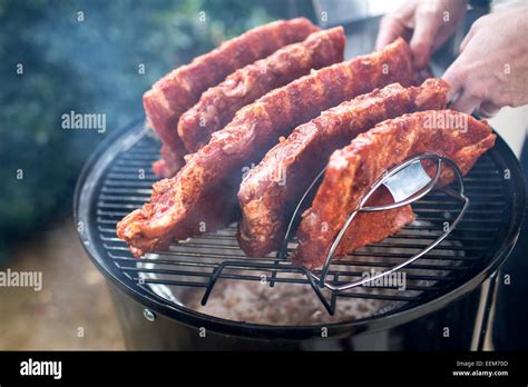 Men Grilling Meat Hi Res Stock Photography And Images Alamy