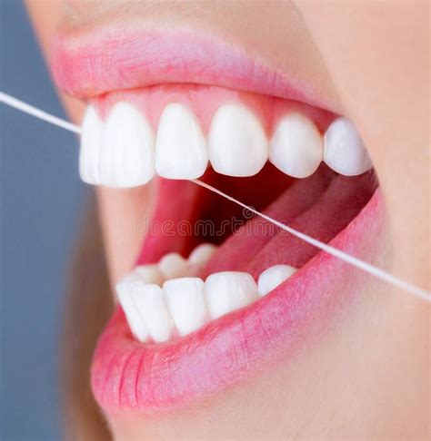 Dental Floss Oral Hygiene And Health Care Smiling Women Use Dental