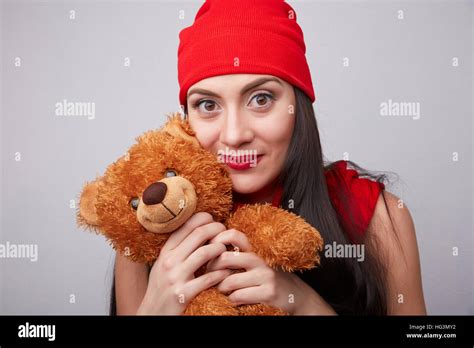Brunette With A Teddy Bear Stock Photo Alamy