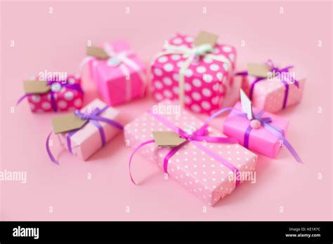 Colored Gift Boxes With Colorful Ribbons Pink Background Gifts For St