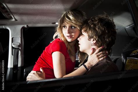 Caucasian Couple Making Out In Back Seat Of Car Stock Photo Adobe Stock