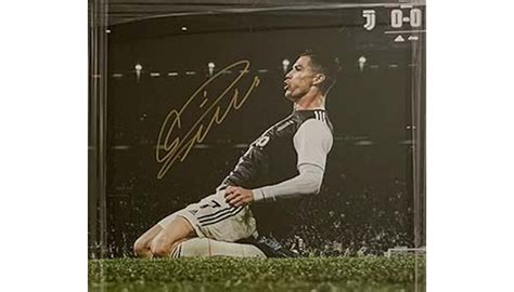 Cristiano Ronaldo Signed Juventus Celebration Photo Framed - CharityStars