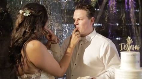 Groom Pranks Bride By Smashing Wedding Cake In Her Face