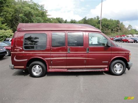 Dark Carmine Red Metallic 1999 Chevrolet Express 1500 Passenger Conversion Van Exterior Photo