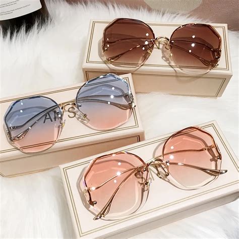 Women Luxury Sunglasses All Season Rimless Designer High Quality