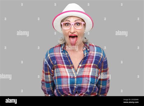 Mature Woman Sticking Out Tongue Hi Res Stock Photography And Images
