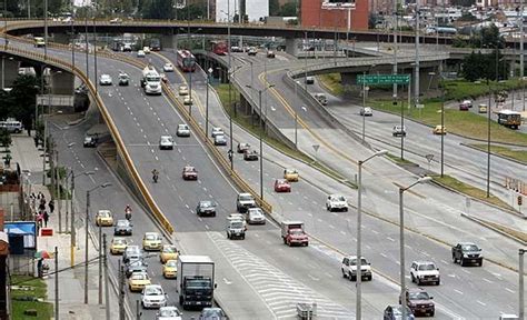 An Overhead View Of Traffic On A Busy Highway In The Middle Of The City