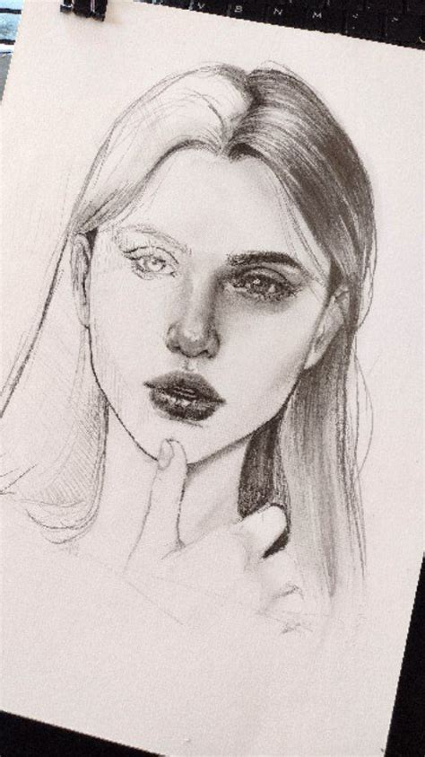 A Pencil Drawing Of A Woman S Face