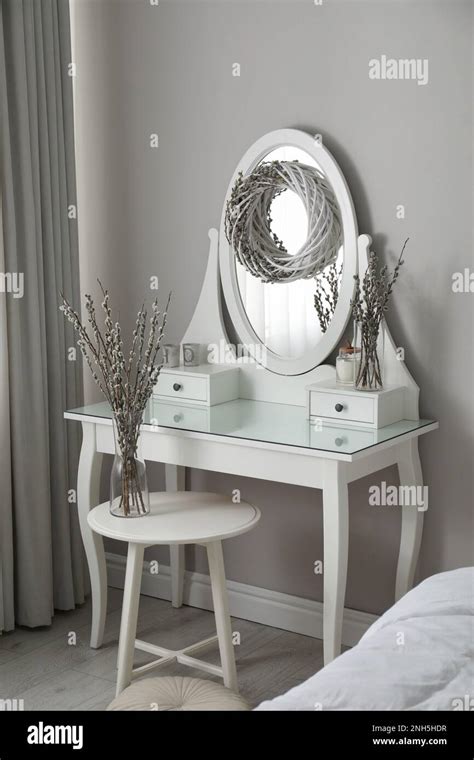 Elegant Dressing Table Decorated With Pussy Willow Branches Indoors Stock Photo Alamy