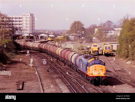 A Class 37 Diesel Locomotive Number 37371 Working A Train Of Two Axle Oil Tanks At Basingstoke