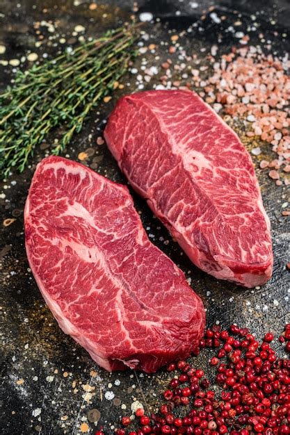 Premium Photo Raw Shoulder Top Blade Cuts Beef Meat Steaks Top View