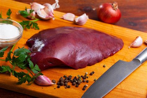 Fresh Raw Pork Liver With Spices On Wooden Table Stock Photo Image Of