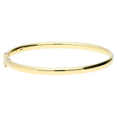 9ct Yellow Gold Solid 4mm Oval Bangle Buy Online Free Insured Uk