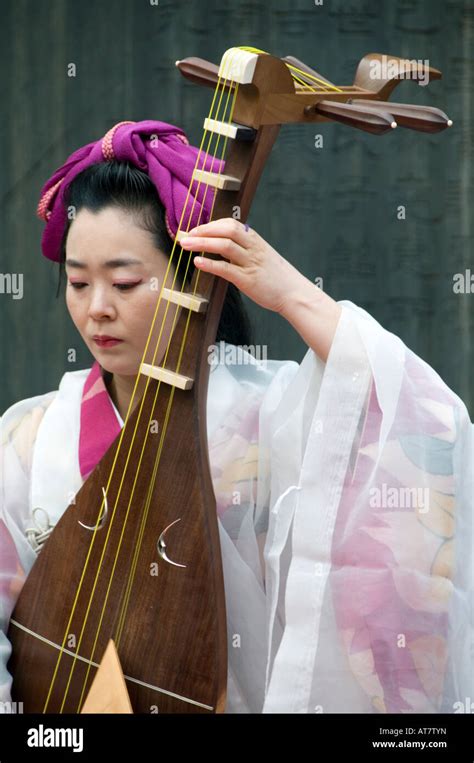 Biwa Player At Yushima Tenjin Ume Matsuri Japanese Apricot Blossom