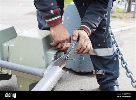 The Worker Replaces The Broken Traffic Light With A Working Traffic