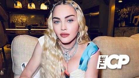 Madonna Wows As She Spills Out Of Black Corset Bra And Fishnets For