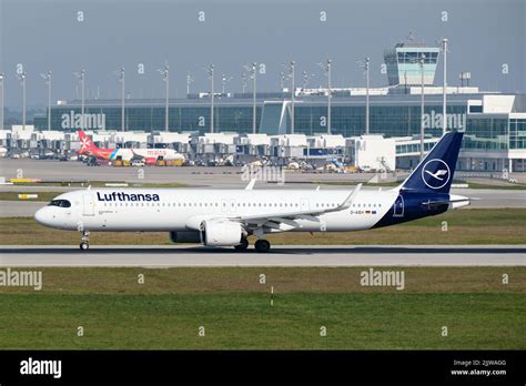 Departing Lufthansa Airbus A321 Airplane In Front Of A Passenger