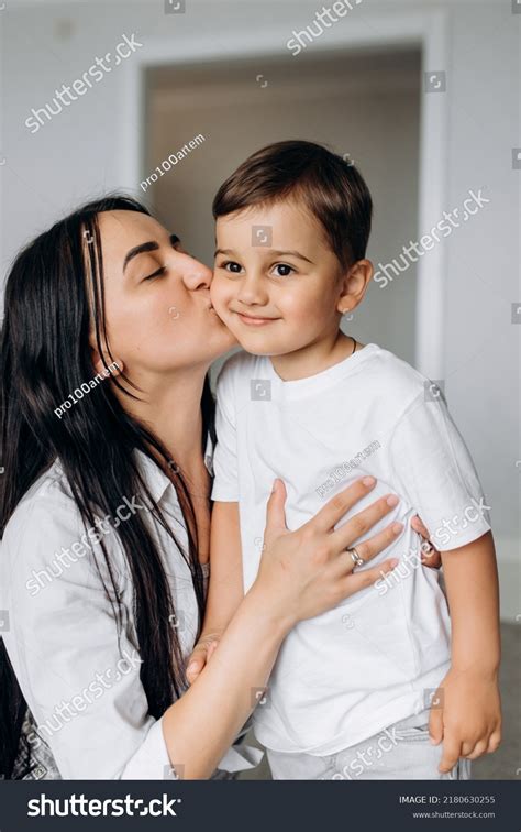 Brunette Mom Kissing Her Son On Stock Photo 2180630255 Shutterstock