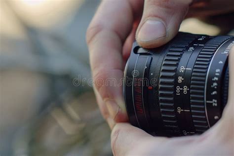 Ai Generative Hand Adjusting Camera Lens Stock Illustration