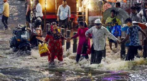 Heavy Rain In Hyderabad Triggers Waterlogging Traffic Jams Govt Declares Holiday For Schools