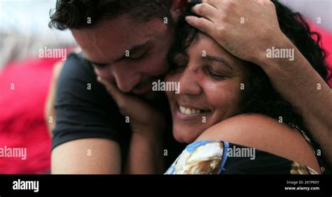 Hispanic Mature Mother And Son Embrace And Love Stock Photo Alamy