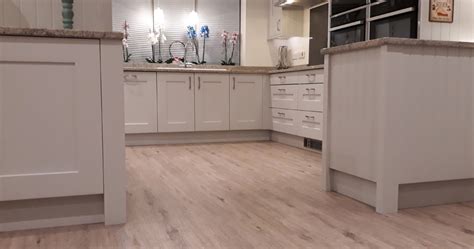 Installing Laminate Flooring In Kitchen Under The Cabinets Kitchen Info