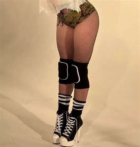 Billie Eilish Strips To Hot Pants And Fishnets To Show Off Legs In High Heels Daily Star