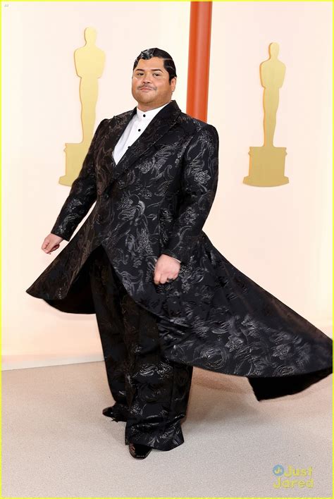 Full Sized Photo Of Harvey Guillen Twirls On Oscars 2023 Red Carpet 07