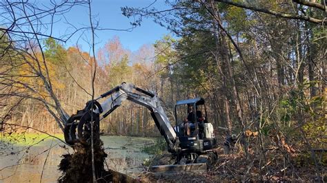 58 Bobcat E42 Reclaiming A Pond Bank YouTube