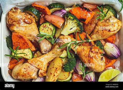 Baked Chicken Legs With Vegetables In The Oven Dish Baked Chicken With