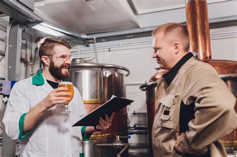 Premium Photo Mature Man Examining The Quality Of Craft Beer At
