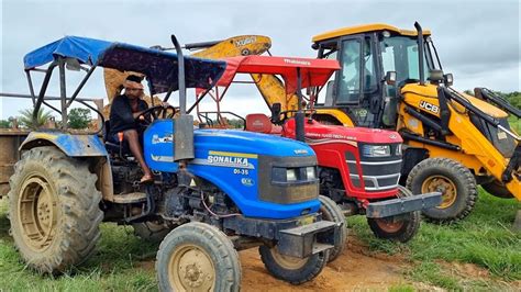 Jcb Eco Excellence 3dx Backhoe Loader Machine Loading Red Mud In