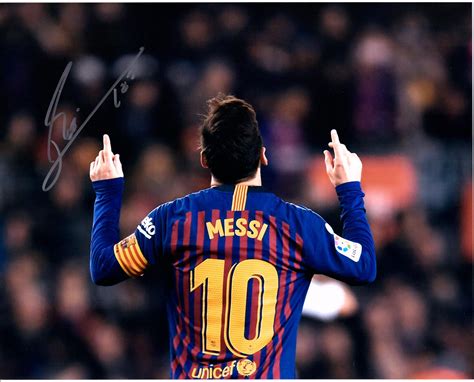 Lionel Messi FC Barcelona Autographed 16 X 20 Pointing Up Photograph