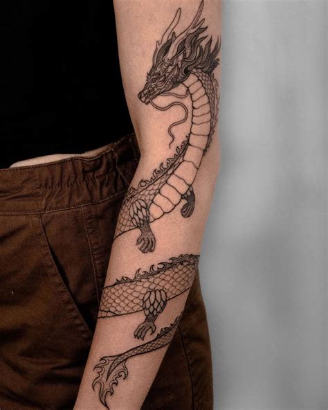 Update More Than Dragon Wrapping Around Arm Tattoo In Cdgdbentre