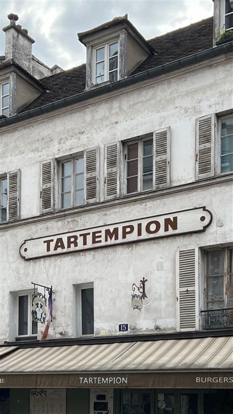 An Old Building With The Word Tartemption On It