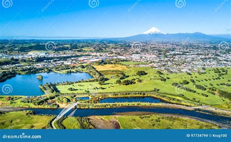 Aerial View On A Beautiful Bridge Across A Small Stream With Mount