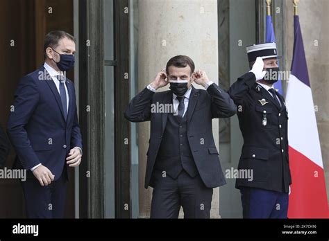 Sebastien Muylaert Maxppp French President Emmanuel Macron Adjusts