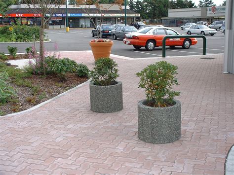 large round exposed aggregate precast concrete planters Burnaby BC - Sanderson Concrete