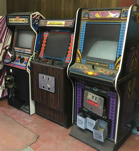 Row Of 1980s Arcade Cabinets Featuring Pole Position Ii