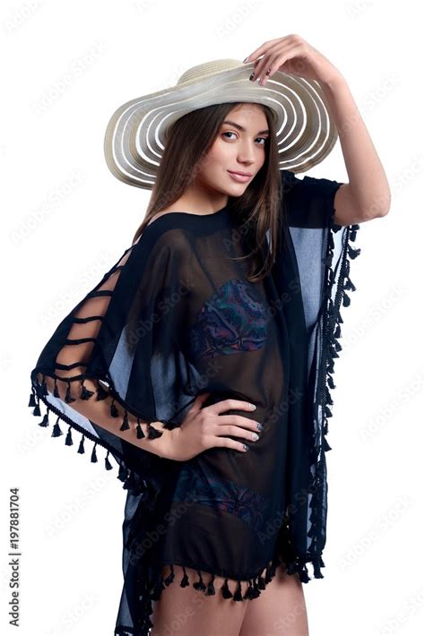 Beautiful Cheerful Brunette Female Posing In Floral Swimsuit And Blue Pareo Touching White Straw