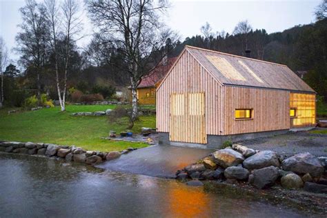 Old Norwegian Boathouse Revamped As A Glowing Summer House