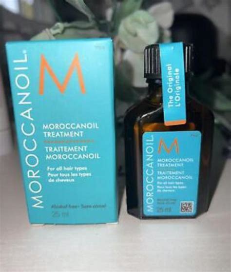 Moroccanoil Treatment Oil With Pump Moroccan Oil Light 200 Ml 68 Oz New And Authenticid