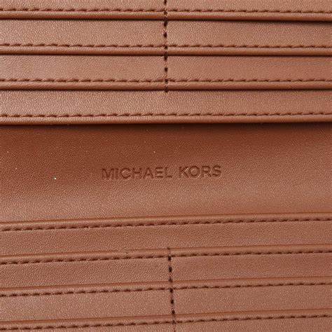 Michael Kors Brown Signature Coated Canvas Reed Wallet For Sale At Stdibs