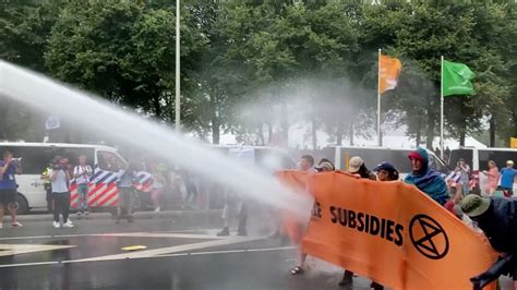 Dutch Police Use Water Cannon To Clear Climate Activists From Highway