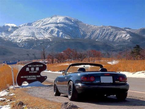 Mazda Mx5 Convertible Car In Snowy Mountains